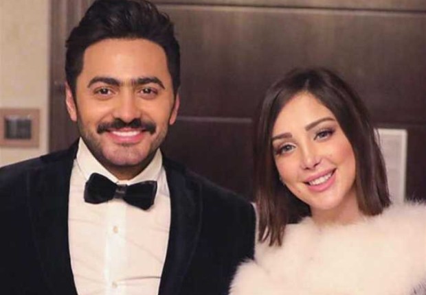 الفنان المصري تامر حسني وزوجته بسمة بوسيل - أرشيفية