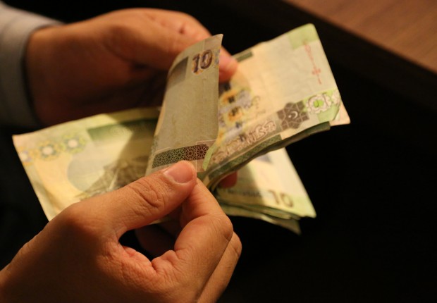 الدولار مقابل الدينار الليبي